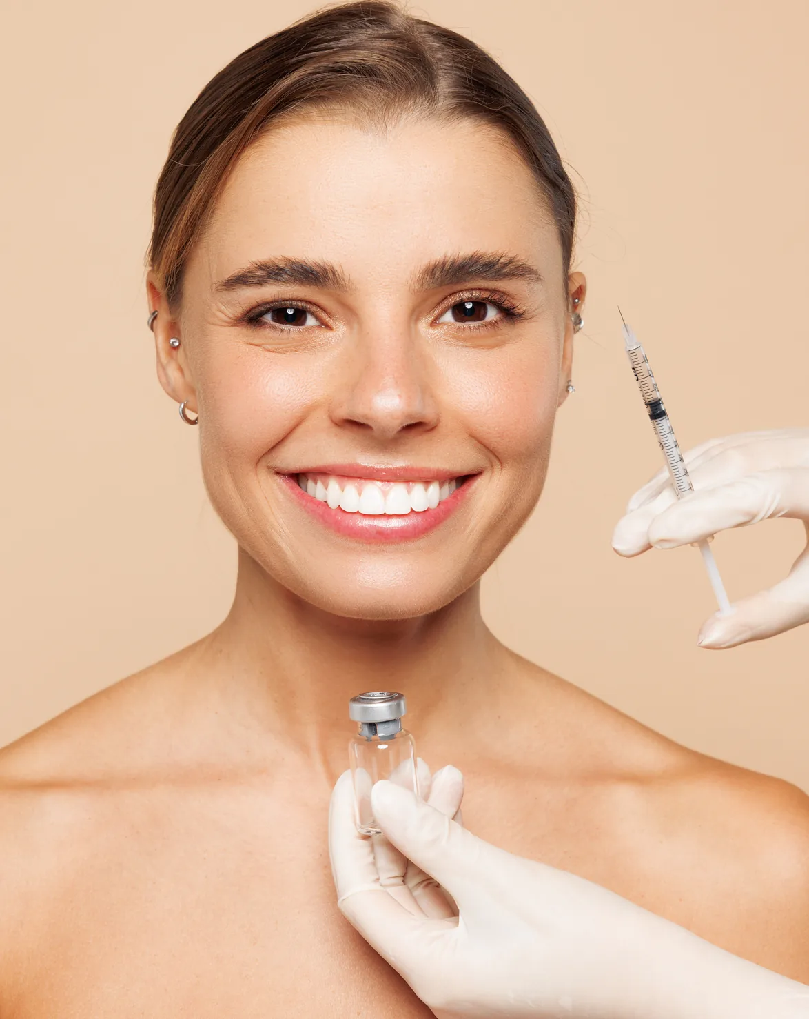 Smiling woman before a skin-quality injection treatment