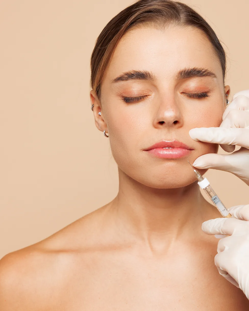 Woman receiving a gentle skin injection treatment